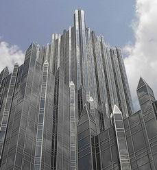 The PPG buildings rise
 skyward, all symetrically in line