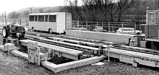 The old farm tractor used to retrieve
disabled cars sits at the North Station.
The converted phone booth to the right
controlled the vehicle transfer table.