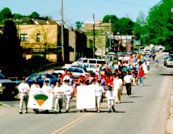 The procession
 nears the Community Center entrance.