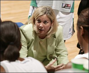 Coach McConnell-Serio
Discussing strategy with the Lynx