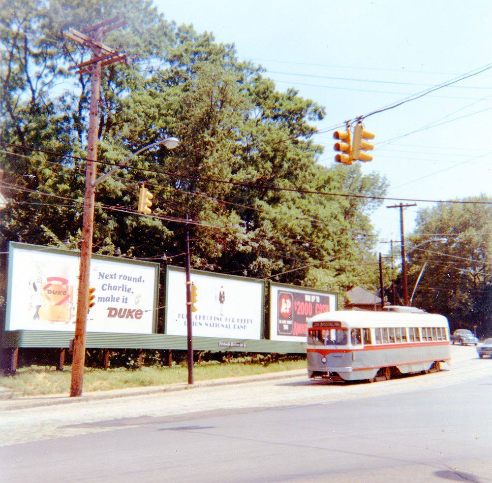 An inbound trolley passes the Brookline Junction
along West Liberty Avenue in the mid-1960s.