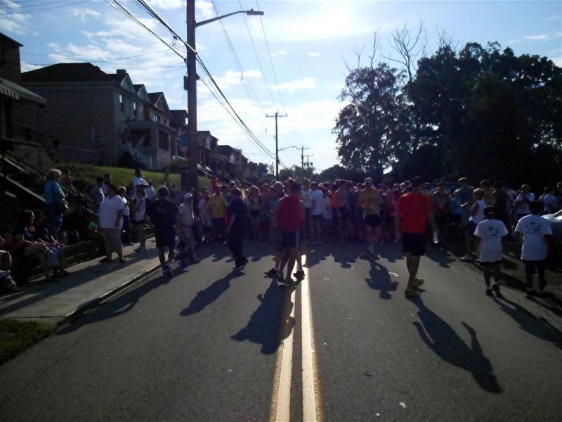 The sun is low and the shadows long
at the 5K start line at 09:00.