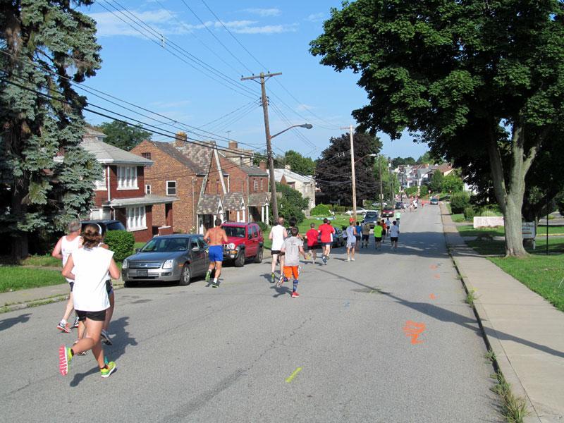 Runners along Pioneer Avenue.