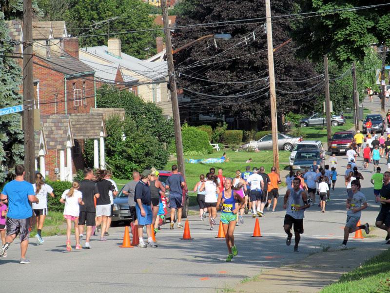 Runners along Pioneer Avenue.