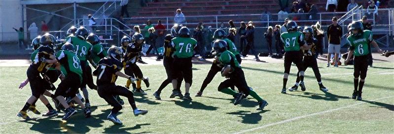 Dominic 'The Bull' Leonard charges forward
for a nice run. Dom is an excellent blocking
back that can also gain the tough yards.