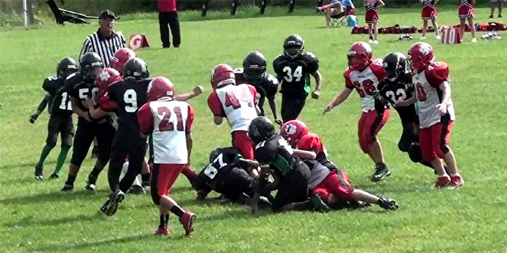 The Brookline defense swarmed all
over the Moon runners.