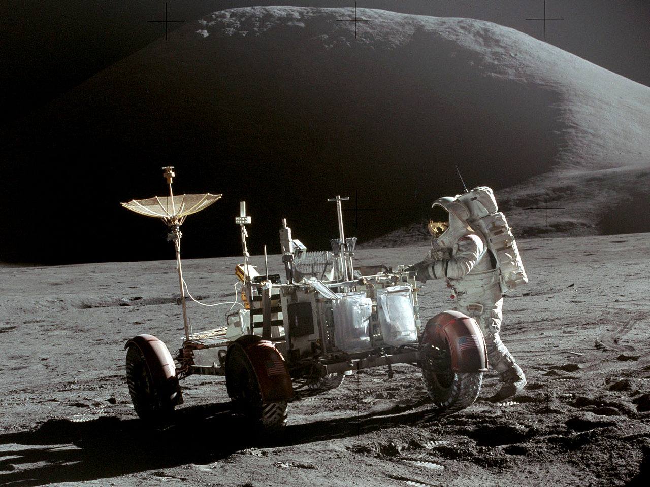 Colonel James Irwin standing
on the surface of the moon.