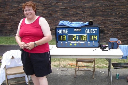 Former Brookline Recreation Leader Maureen
 McNeill returned to take on the scoreboard duties